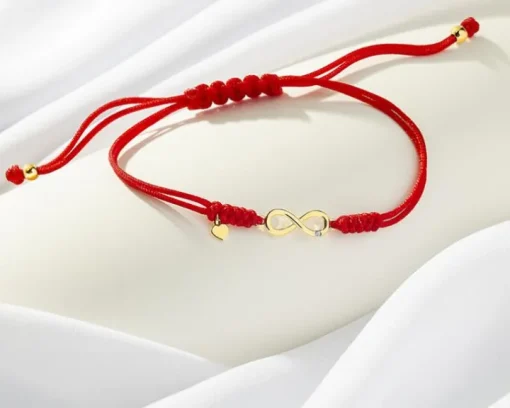 Bransoletka z elementami żółtego złota i diamentem - nieskończoność - 0,004 ct - próba 375
