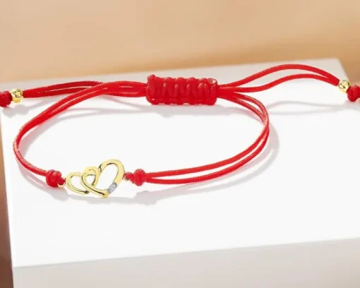 Bransoletka z elementami żółtego złota i diamentem - serca - 0,004 ct - próba 585