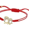 Bransoletka z elementami  żółtego złota i diamentami - sowy - 0,02 ct - próba 375