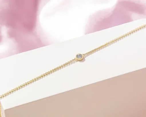 Bransoletka z żółtego i białego złota z diamentem - 0,007 ct - próba 375