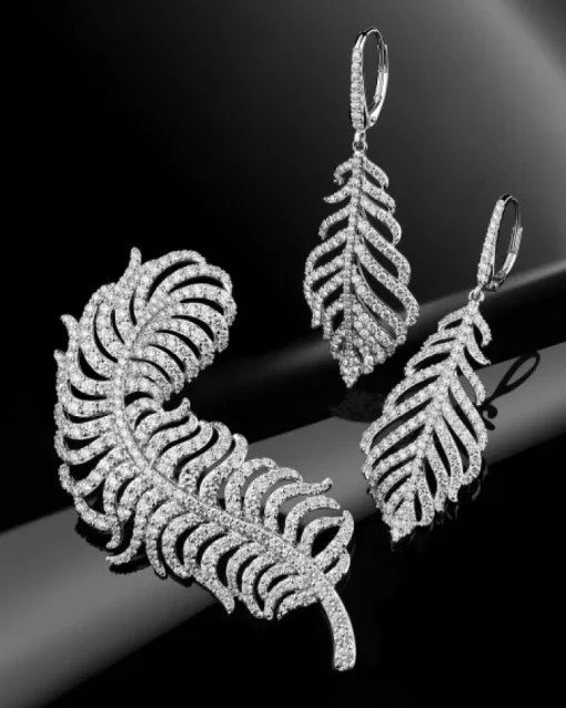 Broszka z białego złota z brylantami - piórko - 5,15 ct - próba 750