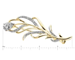 Broszka z żółtego i białego złota z diamentami - piórko - 0,45 ct - próba 585