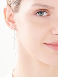Kolczyki z białego złota z diamentami - kwiaty - 0,73 ct - próba 585