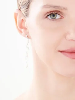 Kolczyki z białego złota z diamentami - kwiaty - 0,73 ct - próba 585