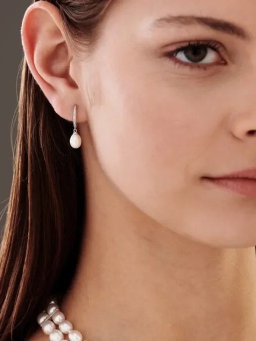 Kolczyki z białego złota z brylantami - 0,05 ct - próba 375