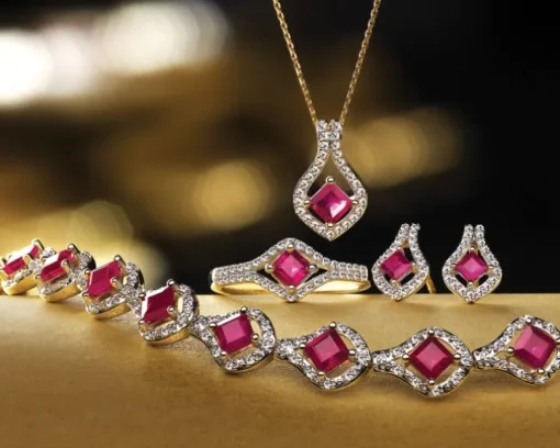 Kolczyki z żółtego złota z diamentami i rubinami - próba 585