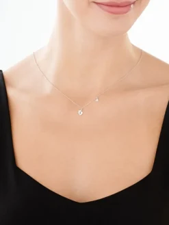 Naszyjnik srebrny z cyrkoniami - stópki, serce