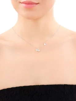 Naszyjnik srebrny z cyrkoniami - litera M, serca