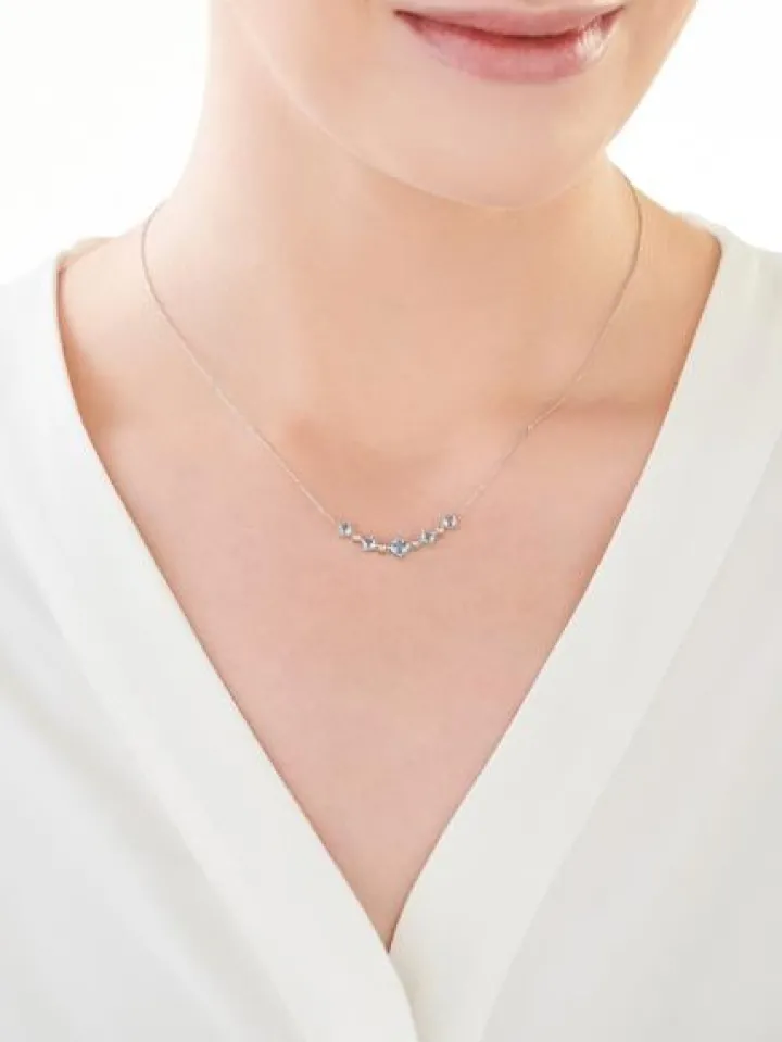 Naszyjnik z białego złota z diamentami i topazami - próba 375