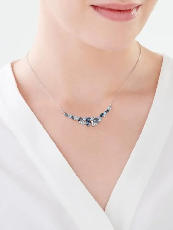 Naszyjnik z białego złota z brylantem i topazami - próba 585