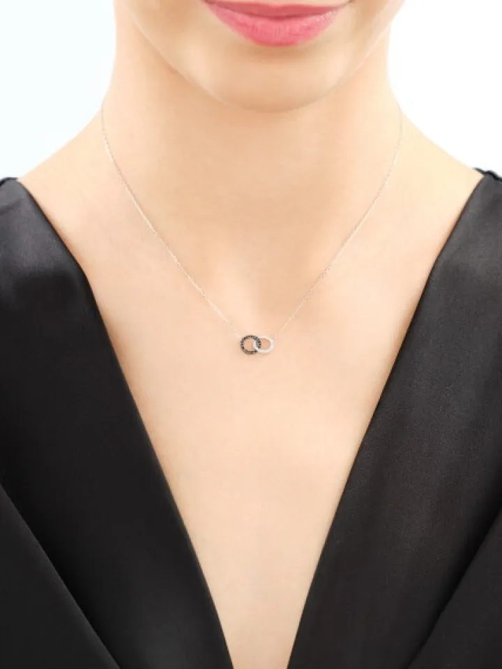 Naszyjnik z białego złota z diamentami - koła - 0,10 ct - próba 375