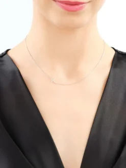 Naszyjnik z białego złota z brylantem – krzyż - 0,006 ct - próba 585