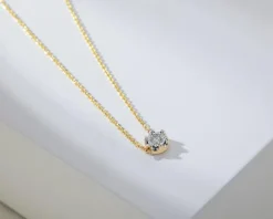 Naszyjnik z żółtego i białego złota z brylantem - 0,05 ct - próba 585