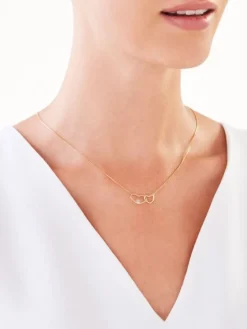 Naszyjnik z żółtego i białego złota z diamentem - serca - 0,003 ct - próba 375