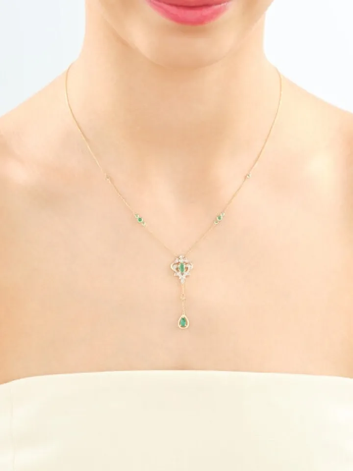 Naszyjnik z żółtego złota z brylantami i szmaragdami - próba 585