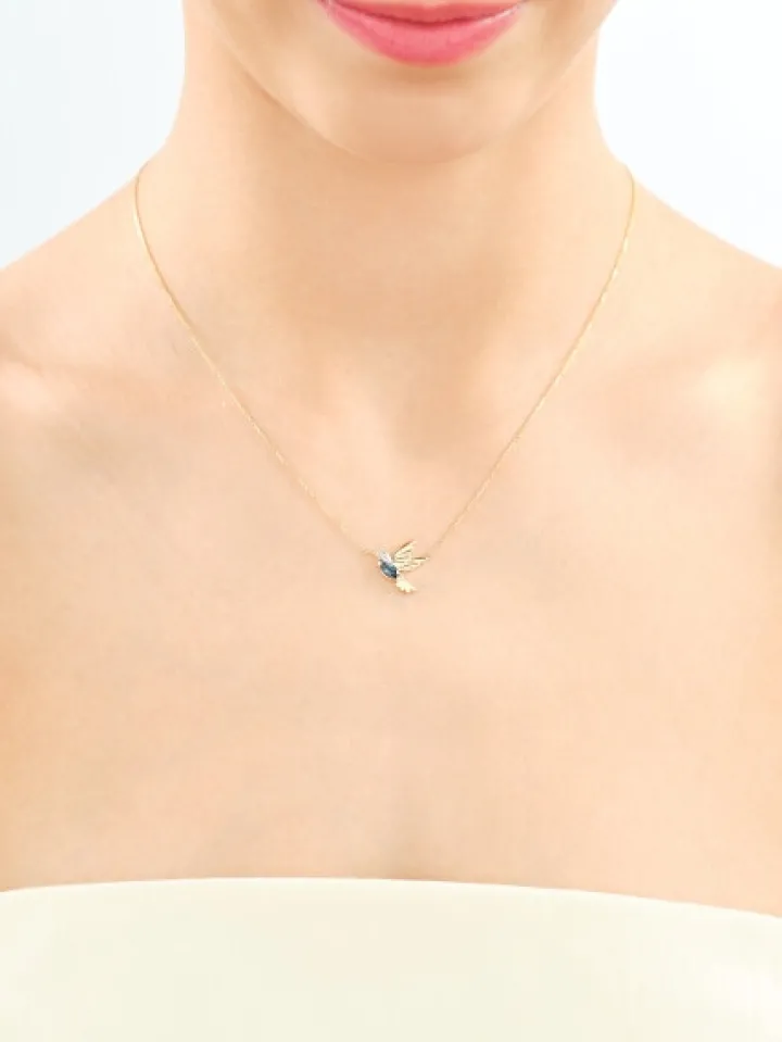 Naszyjnik z żółtego złota z diamentami i topazem London Blue - koliber - próba 375