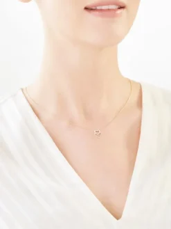 Naszyjnik z żółtego złota z diamentami - serca - 0,01 ct - próba 375