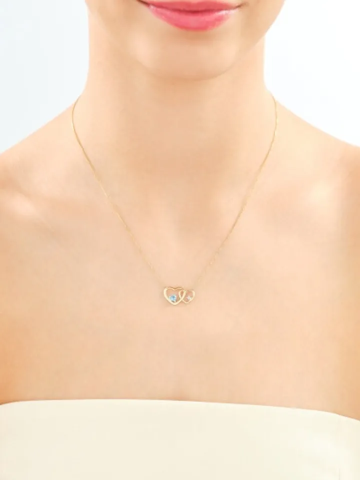 Naszyjnik z żółtego złota z diamentem i topazem - serca - próba 375