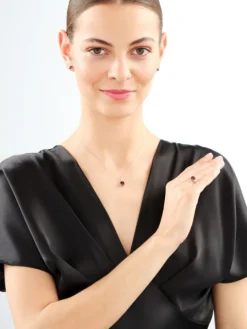 Pierścionek z białego złota z diamentami i granatem - próba 585