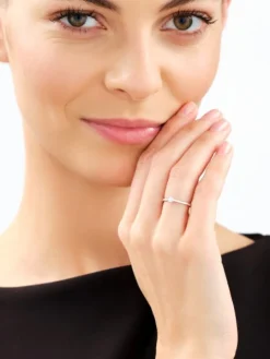 Pierścionek z białego złota z brylantem laboratoryjnym - 0,15 ct - próba 585