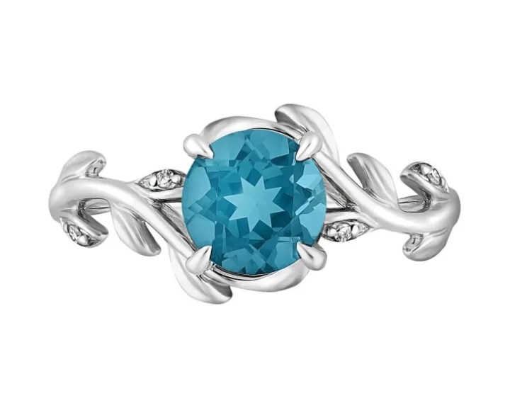 Pierścionek z białego złota z diamentami i topazem London Blue - próba 375