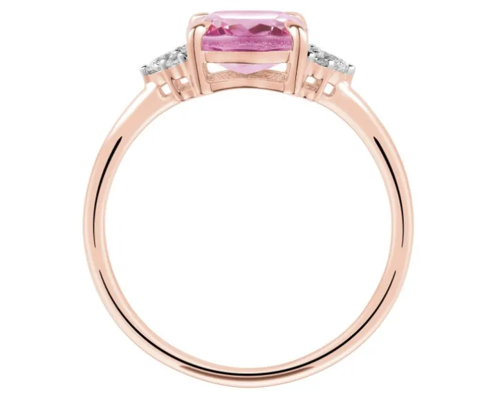Pierścionek z różowego złota z diamentami i topazem - próba 585