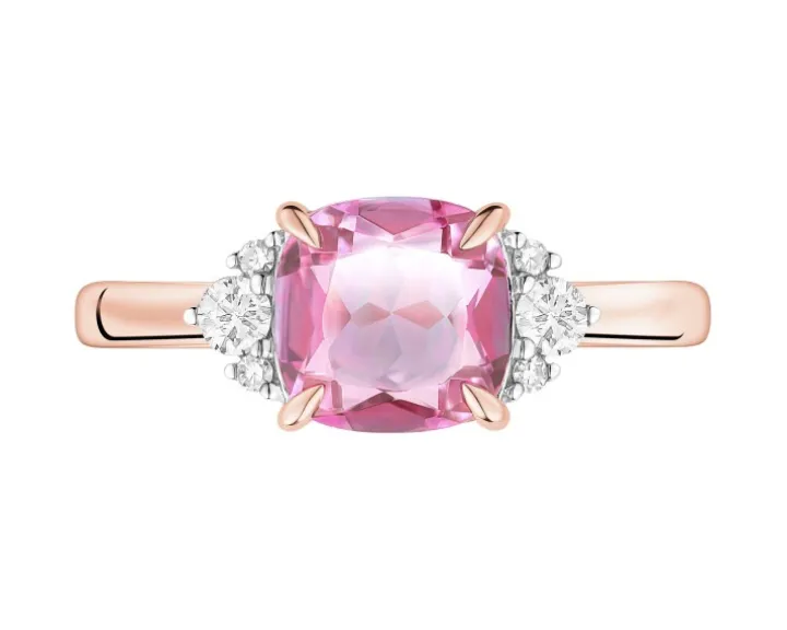 Pierścionek z różowego złota z diamentami i topazem - próba 585