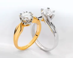 Pierścionek z żółtego i białego złota z brylantami i szmaragdem - próba 585