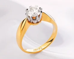 Pierścionek z żółtego i białego złota z brylantem - SI2/H - 0,28 ct - próba 585