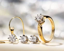 Pierścionek z żółtego i białego złota z brylantem - SI2/H - 0,28 ct - próba 585