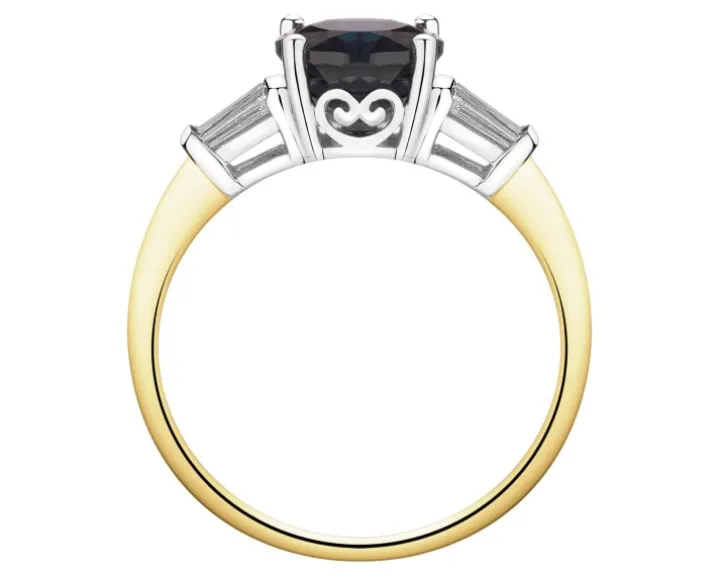 Pierścionek z żółtego i białego złota z diamentami i topazem London Blue - próba 585