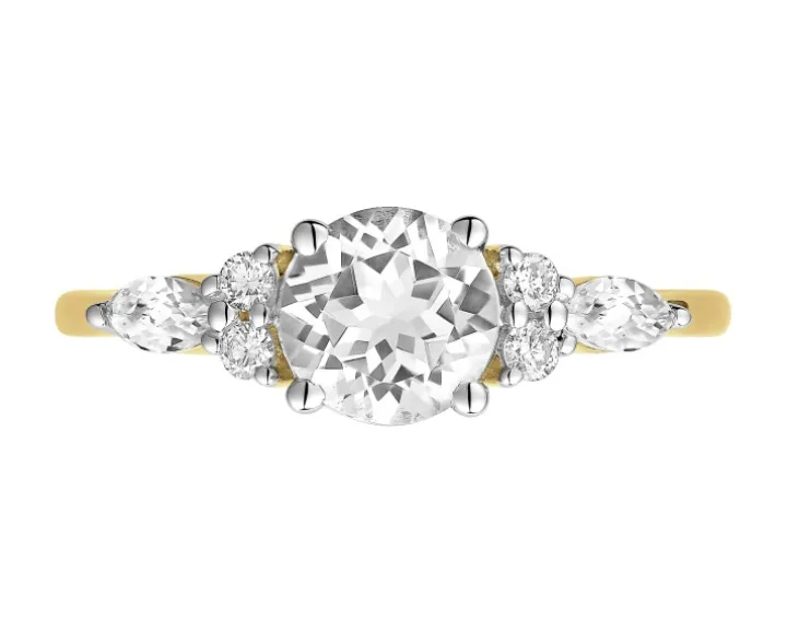 Pierścionek z żółtego złota z brylantami i topazami białymi - próba 585