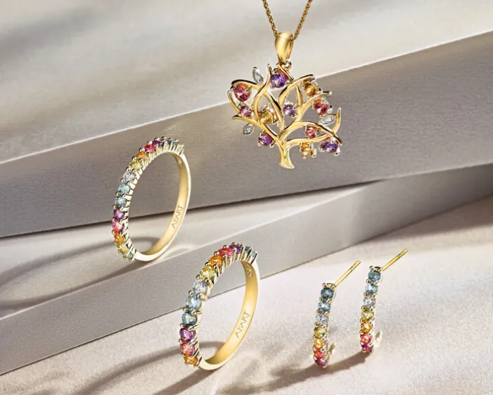 Pierścionek z żółtego złota z brylantem i kamieniami ozdobnymi - próba 375