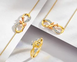 Pierścionek z żółtego złota z diamentami - róża - 0,04 ct - próba 585