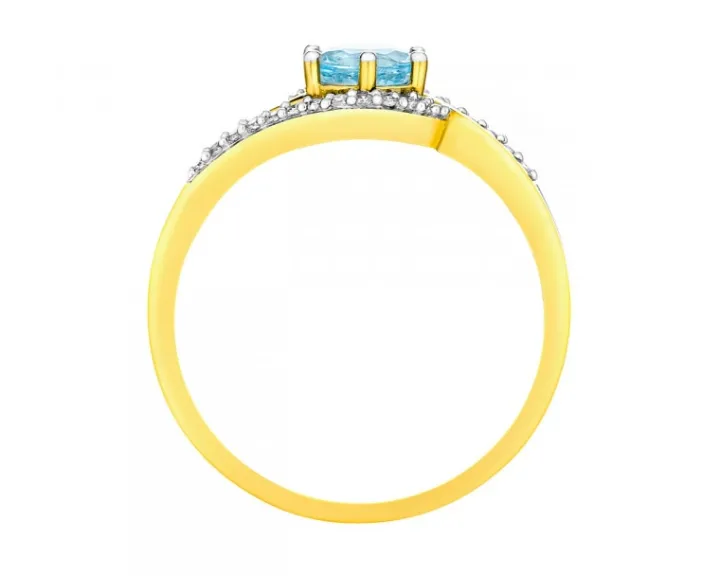 Pierścionek z żółtego złota z diamentami i topazem - próba 585
