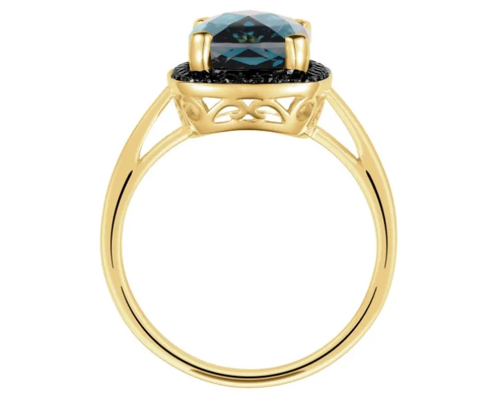 Pierścionek z żółtego złota z czarnymi brylantami i topazem London Blue - próba 585