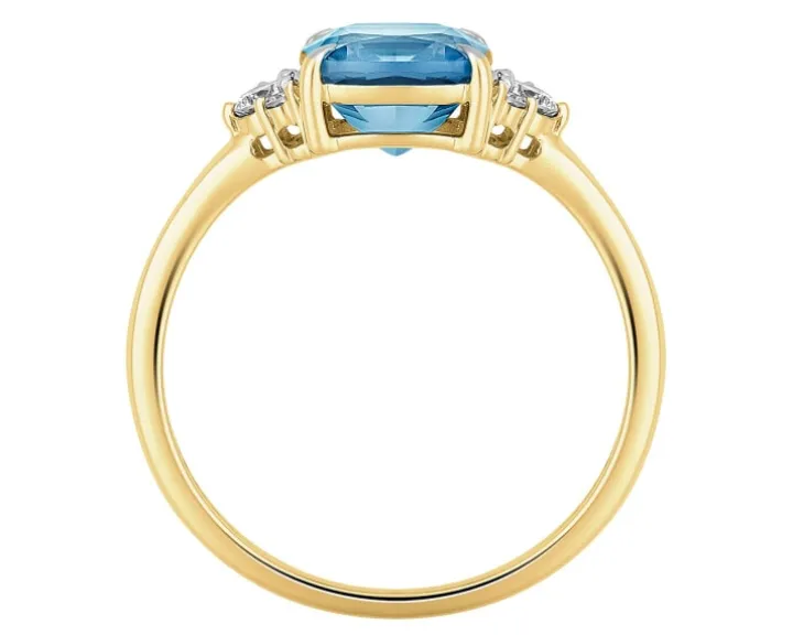 Pierścionek z żółtego złota z diamentami i topazem London Blue - próba 585