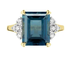 Pierścionek z żółtego złota z brylantami i topazem London Blue - próba 585