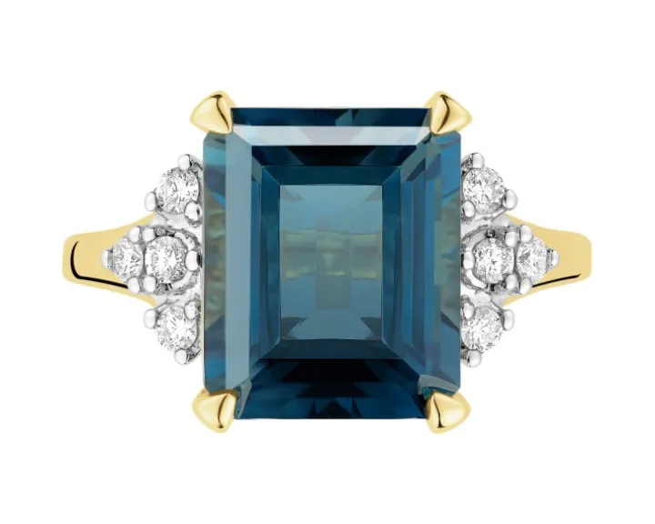 Pierścionek z żółtego złota z brylantami i topazem London Blue - próba 585