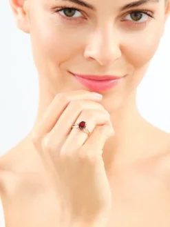 Pierścionek z żółtego złota z brylantami i granatem - próba 585