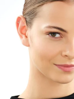 Pojedynczy kolczyk z żółtego złota z diamentami - krzyż - 0,02 ct - próba 375