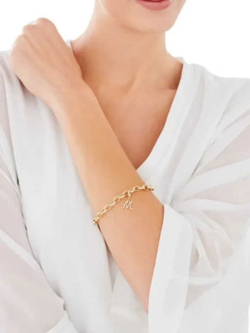 Zawieszka charms z żółtego złota z diamentem - litera M - 0,004 ct - próba 375
