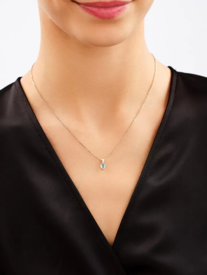 Zawieszka i kolczyki z żółtego złota z diamentami i topazami - komplet - próba 375