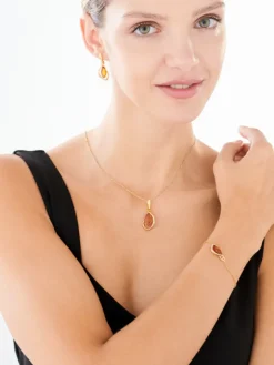 Zawieszka srebrna z bursztynem i cyrkoniami