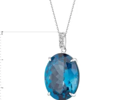 Zawieszka z białego złota z brylantami i topazem London Blue - próba 585