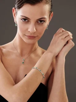 Zawieszka z białego złota z brylantami i szmaragdami - próba 585