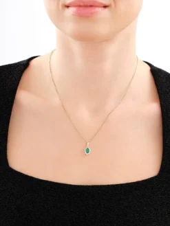 Zawieszka z żółtego i białego złota z brylantem - SI2/H - 0,50 ct - próba 585