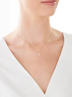 Zawieszka z żółtego i białego złota z brylantem - 0,20 ct - próba 585