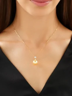 Zawieszka z żółtego złota z brylantami i perłą Golden South Sea - próba 750