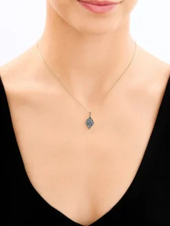 Zawieszka z żółtego złota z czarnymi brylantami i topazami London Blue - próba 585